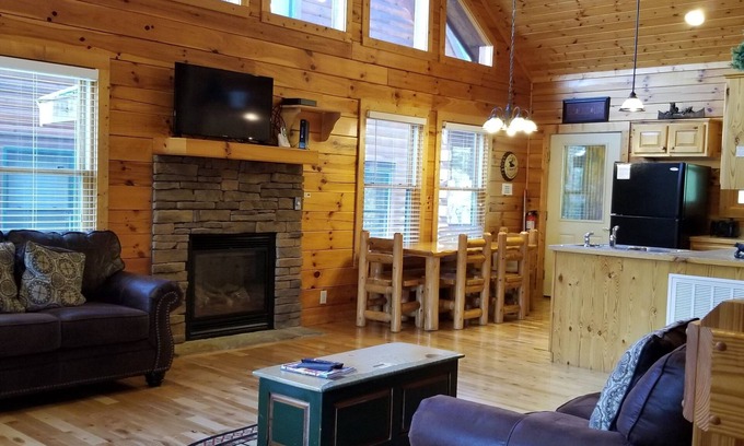 Pigeon Forge Cabin | 5 Min to the Parkway 3 Master Bdrms 3 Baths Sleeps 14 Fun Game Room and Hot Tub!