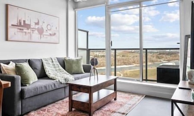 East Village Apartment | 5 min Walk to Stampede | King Bed | Sofa Bed | AC