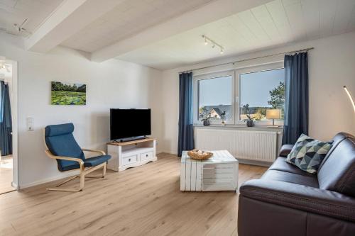 Glowe Apartment | 5 Sterne Ferienwohnung Boddenblick