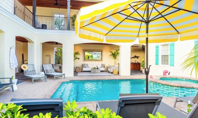 Naples Park House | 505 Sunset Key Estate | Luxury Courtyard Pool Home