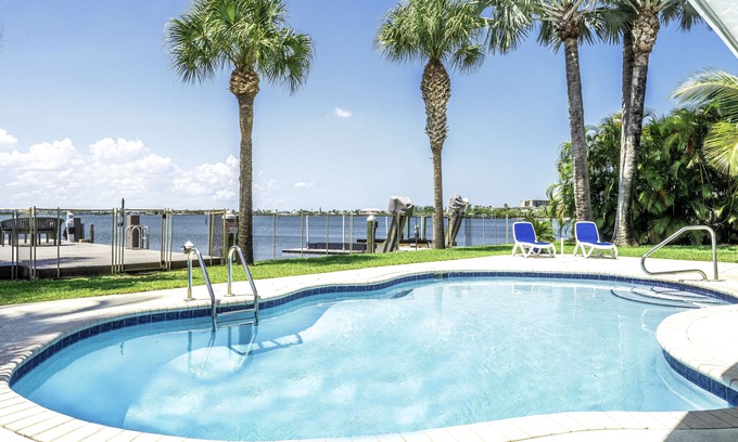 Fort Pierce House | 5BR/4.5B Beach House- heated pool, deep water dock, walk to beach!