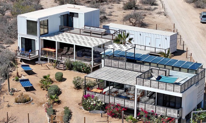 El Sargento House | 5BR/4BA repurposed shipping containers. Game room w/darts, shuffleboard, video games, new 8 person hot tub, multiple decks w/firepits, fast Wifi (250 mb+)w/Starlink backup. Use of SUPs & beach chairs/shade/games. Daily housekeeping optional.