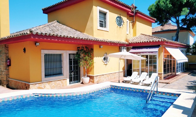 Valdelagrana Ski Chalet | 6 bedroom villa on the harbor beach with wifi, pool, barbecue