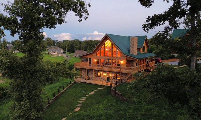 Gilbertsville Cabin | 6 Bedroom Waterfront Log Home with EV charging!