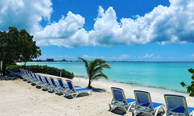 West Bay Condo | 7 Mile Beach private Beach Club, ocean views from Roof deck and Pool Pavilion