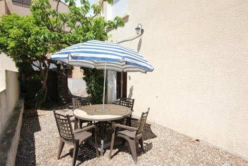 Portiragnes-Plage Apartment | 80m de la plage Appartement au rdc d'une maison 1 chambre 4 couchages cour LXRV9B