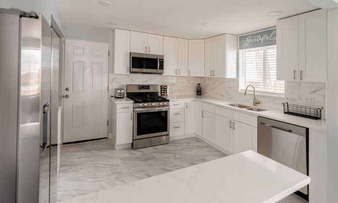 Scenic Heights House | 8673 W 63rd Pl · Golfers Dream! Sweet NW location.
