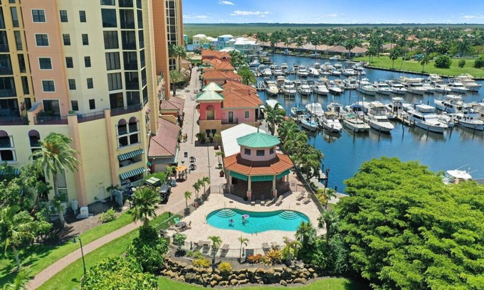 Cape Harbour Condo | 8th-floor condo, 2 sparkling pools, resort style living