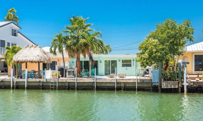 Key Colony Beach House | 9th Street Retreat: Gorgeous Updated Canal Front Home, Dockage, Access to Cabana Club's Pool & Beach