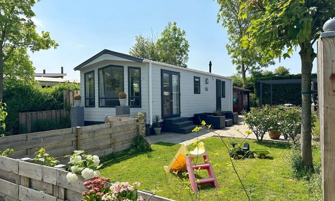 Sint Maarten House | A beautiful and brand new chalet with large terrace, fully fenced garden, private parking, central heating and free WIFI.