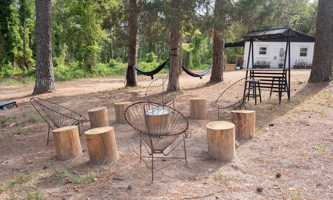 Winnsboro House | A charming quirky retreat nestled amidst the beauty of many majestic trees.