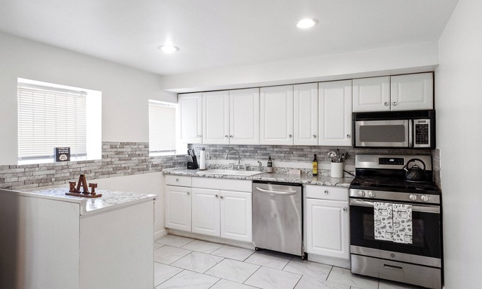 The Gate House | A Cottage in Downtown STL. Sleeps 10
