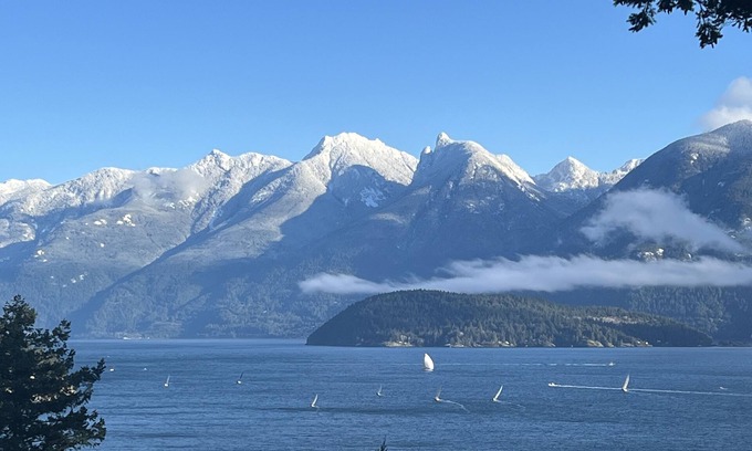 Bowen Island Bed & Breakfast | A cozy guest suite with a panoramic ocean view facing the Howe Sound Mountain