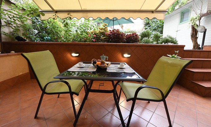 San Giovanni Apartment | a house with many outdoor spaces in the center of rome.