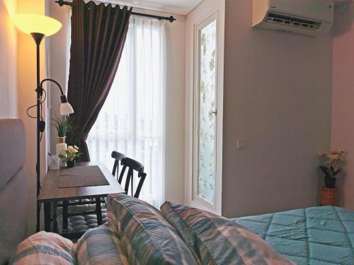 Depok Apartment | A Peaceful Room at Barsacity Apartment by Ciputra