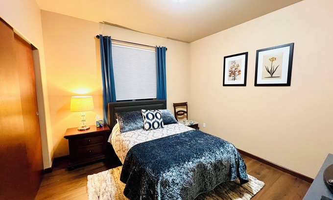 Lacey House | A private bedroom with AC in a quiet neighborhood