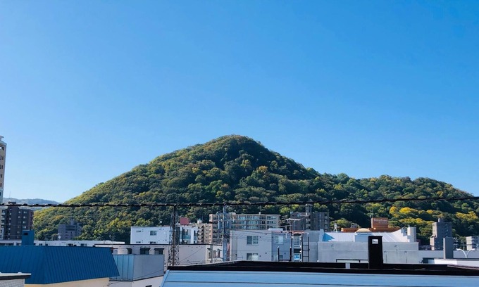 Chuo-ku House | A retromodern room with a blend of Scandinavian and Japanese taste The concierge resides onsite - Maruyama JYURAK / Sapporo Hokkaidō