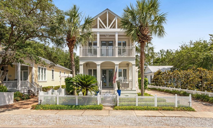 Sunnyside House | A Stone's Throw - Carillon Beach across from one of 3 pools, 3-min walk to beach