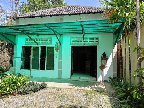 Sangkat Sla Kram House | A two-bedroom home with natural light and green environment