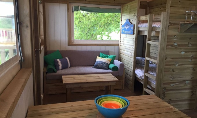 Henansal Cabin | A two bedroom luxury lodge with extra cabin beds, heated covered pool