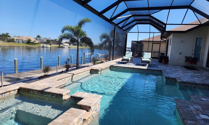 South Gulf Cove House | A100+ REVIEW WATERFRONT LUXURY HOME w/HEATED POOL&SPA/GULF ACCESS/CLOSE TO BEACH
