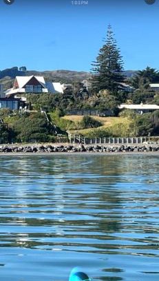 Raumati South House | Absolute Beachfront Holiday Home With Private Beach Access To Swim Beach Spectacular Sunsets