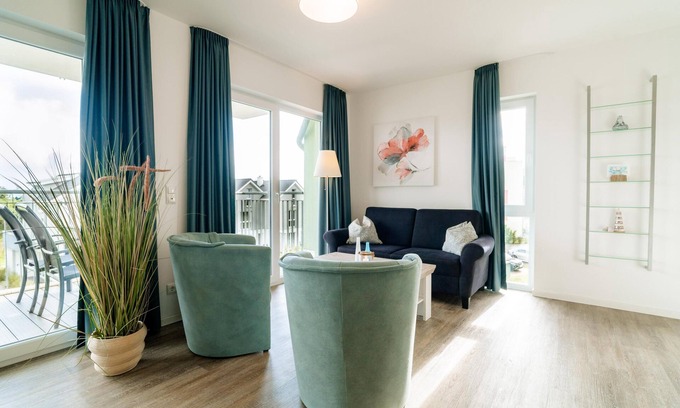 Schillig Apartment | "Achtern Diek" - Holiday apartment with sea view and private sauna by the North Sea
