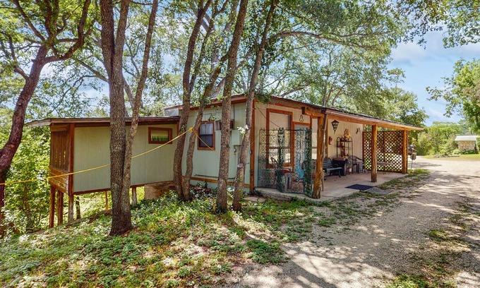 Ingram House | Adorable dog-friendly cottage with screened porch, grill, pool, kitchenette
