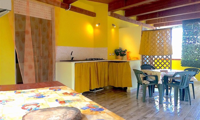 La Taulera Apartment | Alghero, Spiagge Bianca Maria Pia, beautiful veranda with outdoor kitchen