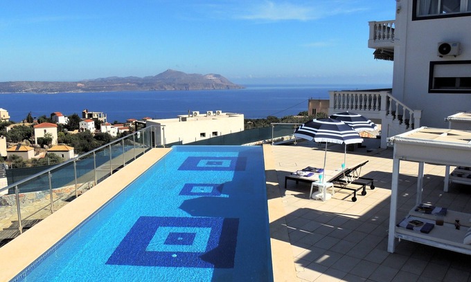 Kokkinon Khorion Villa | Amazing 14m infinity pool, outside dining & lounge area, sea views, & big garden