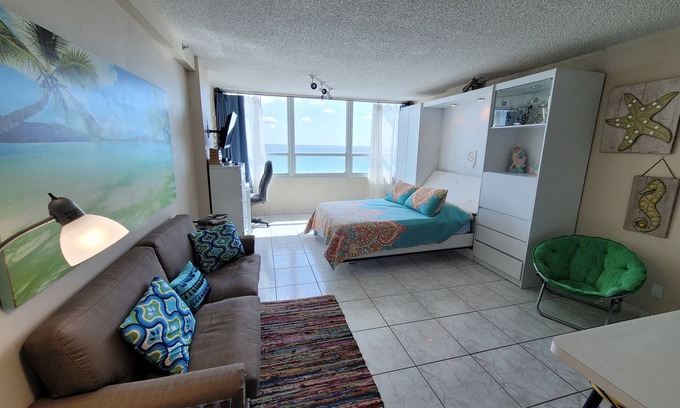Mid Beach Apartment | AMAZING BCHFRNT UNIT WITH POOL,TIKKI BAR, FREE PARKNG, WI-Fi, GYM & TENNIS COURT