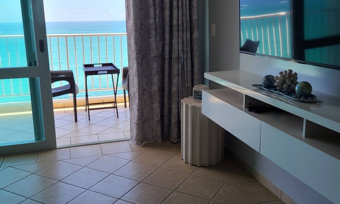 Isla Verde Condo | Amazing Ocean View! 5 min. to the airport, Street walk to hotels, casinos, rest.