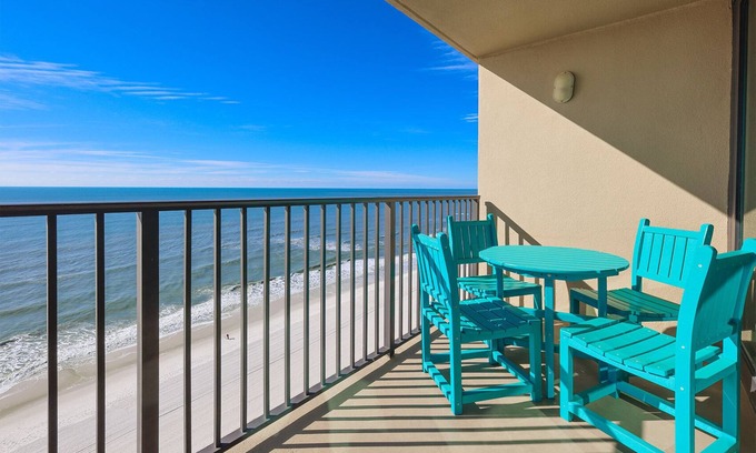Gulf Shores Condo | AMAZING SUNRISE VIEW! Full Kitchen & Living Room! Corner Unit!