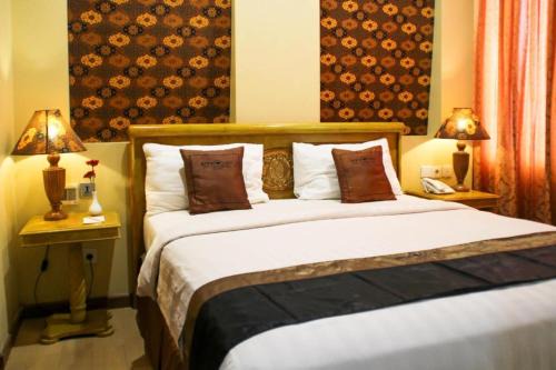 Melawai Hotel | Amos Cozy Hotel Melawai