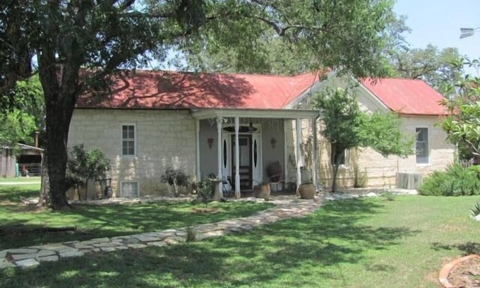 Fredericksburg House | An art filled, 120 year old limestone house, 4 blocks from Main St.