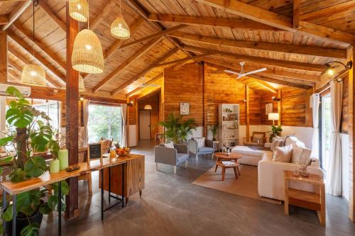 Karjat Villa | Anjee's Chalet by StayVista - Mountain-view villa with Classic wooden interiors, Lush lawn & Snooker table