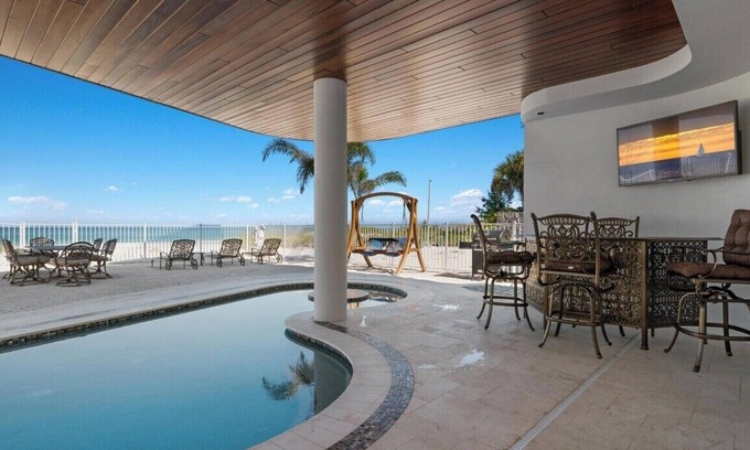 Ilexhurst House | Anna Maria Wave: Stunning Beachfront Home with Pool & Poker Room