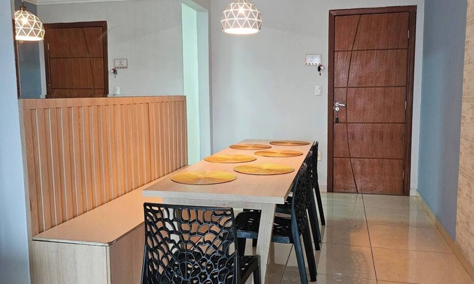 Contagem Apartment | Apartment 1 km from the beach with air conditioning and garage