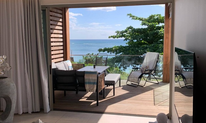 Pointe Aux Piments Apartment | Apartment beachfront, 3 bedrooms with huge pool ont the sea!
