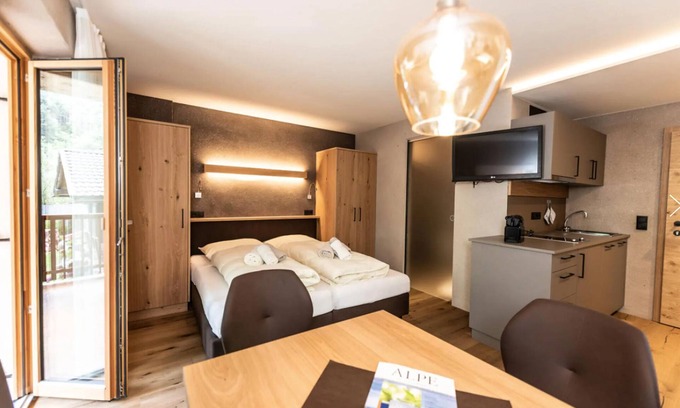 Siusi Apartment | Apartment "Bergfrieden 2 A" with Mountain View, Pool, Wi-Fi, Terrace & Garden