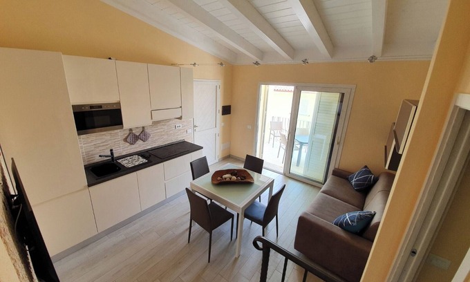 Trinita d'Agultu e Vignola Apartment | Apartment 'Caprera' with Private Terrace, Wi-Fi and Air Conditioning