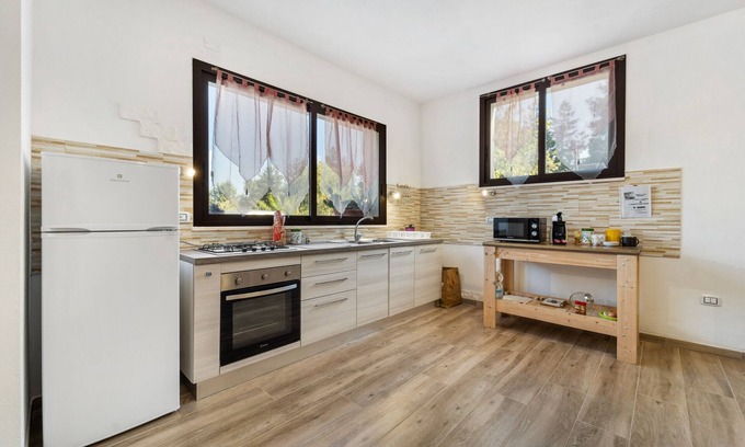 Iglesias Apartment | Apartment "Casa di Ale, Gabry e Nina" with Shared Terrace & Wi-Fi
