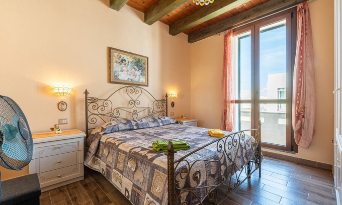 Calasetta Apartment | Apartment 'Da Giò, A Due Passi Dal Mare' with Private Terrace and Air Conditioning