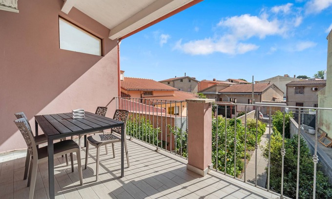 Sant'Antioco Apartment | Apartment 'Di Pina' with Private Terrace, Shared Garden and Air Conditioning