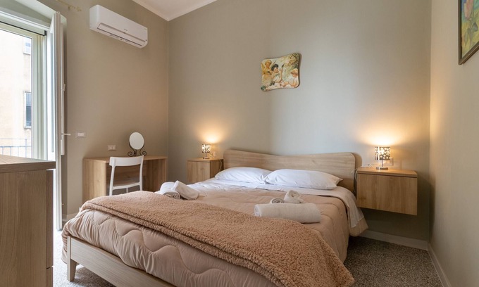Mottola Apartment | Apartment 'Dormiamoci Sù' with Balcony, Wi-Fi and Air Conditioning