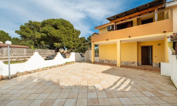 Porto Pino Apartment | Apartment 'Ella' with Private Terrace, Private Garden and Balcony