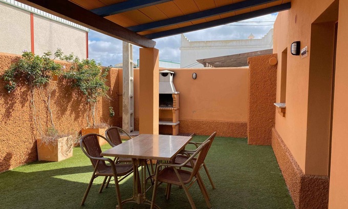 El Palmar House | Apartment for 4 people with private garden and barbecue near the beach