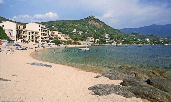 Tiuccia Apartment | Apartment feet in the water (1 minute walk from the beach)