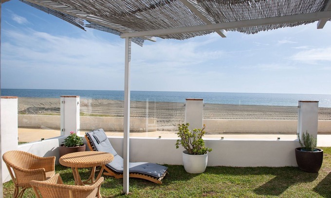 Bahia Dorada Apartment | Apartment for 3 people on the beach 75m2 +terrace and garden.