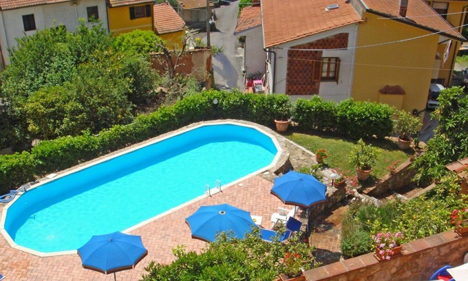 Massarosa House | Apartment in villa with pool, internet, TV, terrace, panoramic view, parking, close to Viareggio